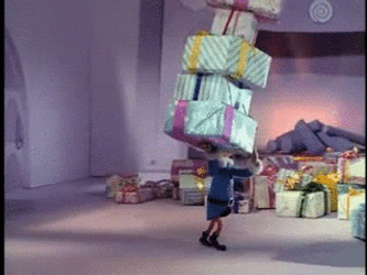 Yukon Cornelius Head Elf Preparing Gift GIF