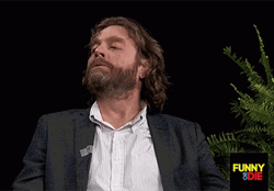 Zach Galifianakis Looking Up And Down GIF