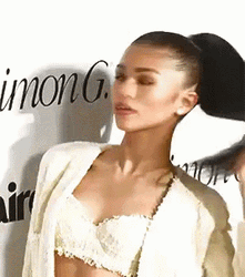 Zendaya Flipping Long Hair GIF