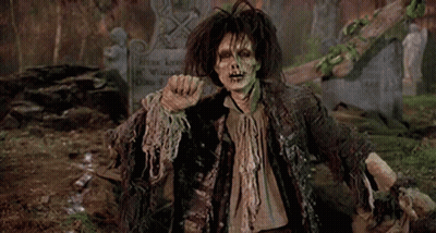 Zombie Standing In Front Of Grave GIF